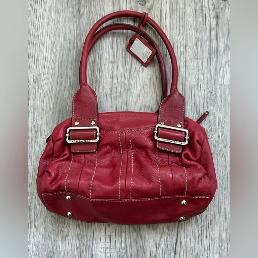 Tignanello Cherry Leather Handbag with Silver Buckle